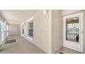 Welcoming entrance with well-lit porch and secure front door at 4211 Caddie E Dr # 202, Bradenton, FL 34203