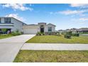 Attractive single-Gathering home with well-maintained lawn, a two-car garage and inviting curb appeal at 4405 Weathered Moss Gln, Palmetto, FL 34221