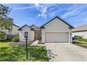 Inviting single story home with well-maintained front yard and attached garage at 1107 22Nd E St, Palmetto, FL 34221