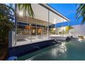 A gorgeous pool with an attached patio and outdoor seating at 1168 Westway Dr, Sarasota, FL 34236