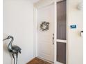Charming entryway with a decorative wreath and a heron statue adding a touch of elegance at 7840 34Th Ave W # 303, Bradenton, FL 34209