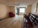 Inviting living room with comfortable seating and ample natural light, perfect for relaxation at 4199 66Th Street W Cir # 4199, Bradenton, FL 34209