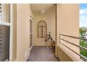 Cozy balcony featuring decorative metal bird art and a faux window for added charm and stylish decor at 4440 Fairways Blvd # 310, Bradenton, FL 34209