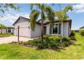A well-maintained single-Gathering home with manicured landscaping at 7758 Summerland Cv, Bradenton, FL 34202