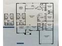 Detailed floor plan showcasing the layout of a four-bedroom home, including a Primary suite, kitchen, and living areas at 8464 Ginsberg Ter, North Port, FL 34287
