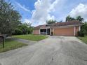 Charming single-Gathering home with a well-maintained lawn and a two-car garage at 6305 Bikini Rd, Sarasota, FL 34241