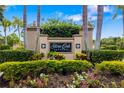 Silver Oak Estates entrance sign surrounded by manicured landscaping and mature trees, creating an inviting atmosphere at 8999 Wildlife Loop, Sarasota, FL 34238