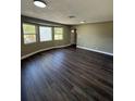 Bright living room boasts wood floors, large windows, and ample natural light at 1132 26Th S Ave, St Petersburg, FL 33705