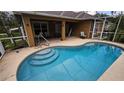 Sparkling pool with a tanning deck and patio perfect for relaxation at 17215 Berwin Ave, Port Charlotte, FL 33948