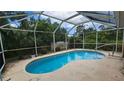 Inviting screened-in pool offering a private outdoor retreat at 17215 Berwin Ave, Port Charlotte, FL 33948