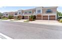 Inviting townhomes with garages, manicured landscaping, and paved streets create an appealing community atmosphere at 4235 Overture Cir # 4235, Bradenton, FL 34209