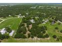 Spacious lot featuring mature trees, green space, and a neatly defined boundary, perfect for a private estate at 7343 Palomino Trl, Sarasota, FL 34241