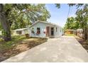 Charming single-story home featuring a manicured lawn, private driveway, and delightful curb appeal at 1008 37Th W St, Bradenton, FL 34205