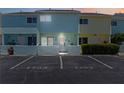 Charming two-story condo featuring pastel colors and reserved parking at 1753 Dawn St # 305, Sarasota, FL 34231