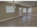 Bright living area with recessed lighting, tiled floor and abundant natural light at 2629 14Th S Ave, St Petersburg, FL 33712
