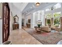 Spacious foyer showcasing soaring ceilings, elegant decor, and an open floor plan leading into the living areas at 550 Dove Pointe, Osprey, FL 34229