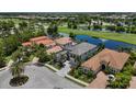 Panoramic aerial view of a luxurious home, showcasing its premium lot and lush landscaping at 7634 Windy Hill Cv, Bradenton, FL 34202