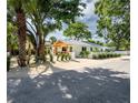 Well-maintained single-story house with mature landscaping at 2189 Hillview St, Sarasota, FL 34239