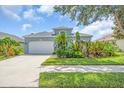 Charming single-Gathering home with well-maintained lawn and garden at 7026 43Rd E Ave, Palmetto, FL 34221