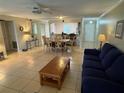 Inviting living room and dining area with tile flooring and neutral tones at 3810 75Th W St # 137, Bradenton, FL 34209