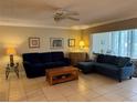 Cozy living room with neutral walls, tile floors and modern furnishings at 3810 75Th W St # 137, Bradenton, FL 34209
