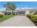 Charming single-story home with covered carport and landscaped lawn, a welcoming facade at 4414 Mount Vernon Dr # 1, Bradenton, FL 34210