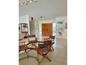Inviting living room with tile floors and an open layout at 3764 Torrey Pines Blvd, Sarasota, FL 34238