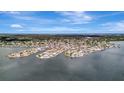 Expansive aerial shot showing waterfront homes nestled along bays, showcasing prime coastal real estate opportunities at 4819 Palmetto Point Dr, Palmetto, FL 34221