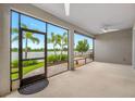 The screened lanai has serene lake views and provides the perfect spot for relaxation at 6550 Devesta Loop, Palmetto, FL 34221