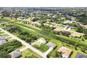 Aerial view showcases the community layout, and surrounding landscape at 8429 Malcolm Ave, North Port, FL 34287