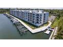 Modern condo building with boat slips and a waterfront view at 1709 N Tamiami Trail # Ph 514, Sarasota, FL 34234