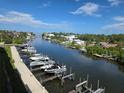 Beautiful view of the channel with boats parked at the residence's docks at 1709 N Tamiami Trail # Ph 514, Sarasota, FL 34234