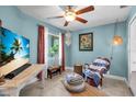 Cozy living room featuring a comfortable seating area and bright natural light at 529 Sunset N Rd, Rotonda West, FL 33947