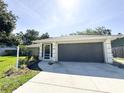 Well-maintained single-story home with a two-car garage and manicured landscaping at 4913 32Nd E St, Bradenton, FL 34203
