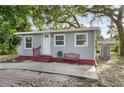 Charming single-story home with a well-maintained exterior and landscaped yard at 2005 Gillespie Ave, Sarasota, FL 34234