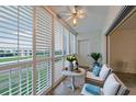 Cozy balcony sitting area with a view at 3680 Ironwood Cir # 603L, Bradenton, FL 34209