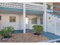Property doorway showing the address and landscaping in front of the building at 5891 Welcome Rd # I6, Bradenton, FL 34207