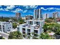 Modern condo exterior with sleek lines and balconies offering scenic views at 626 Rawls Ave # 626, Sarasota, FL 34236