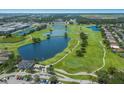 Beautiful aerial shot of a golf course community with water features and luxury apartments and homes at 1245 Millbrook Cir, Bradenton, FL 34212