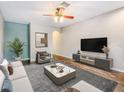 Bright living room featuring stylish furnishings, modern decor, and an inviting ambiance at 245 Cape Harbour Loop # 103, Bradenton, FL 34212