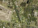 Expansive aerial view showcasing a property's boundaries, highlighting its generous size and potential for development at 3511 39Th E St, Palmetto, FL 34221