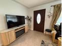 Inviting entryway with tiled floor, decorative console table and stylish furniture accents at 4337 15Th N Ave, St Petersburg, FL 33713