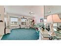 Bright living room featuring large windows offering views of the outdoor scenery at 5078 47Th W St, Bradenton, FL 34210