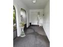 Inviting entryway with tiled floors and decorative decor at 1725 Briar Creek Ln, Sarasota, FL 34235
