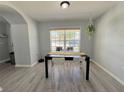 Cozy dining room with lots of natural light, a table, and white chairs at 2122 Pleasure Run Dr, Ruskin, FL 33570