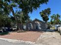 Charming home featuring a brick driveway, complemented by mature trees providing ample shade at 2804 11Th Street E Ct, Bradenton, FL 34208