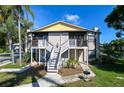 Updated condo exterior with private balcony, well-maintained landscaping, and convenient parking at 3539 59Th W Ave # 3539, Bradenton, FL 34210