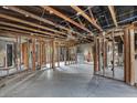 Interior view of a home undergoing renovation, showing exposed wooden beams and studs at 268 Alsace Ave, Venice, FL 34293
