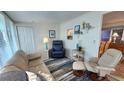 Comfortable living room featuring relaxing furniture and nautical decor at 3333 26Th E Ave # 1145, Bradenton, FL 34208