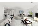Open-concept living space with a modern kitchen, dining area, and comfortable seating, perfect for entertaining at 7611 34Th W Ave # 301, Bradenton, FL 34209